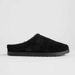 Alo Recovery Slipper in the black suede color with a faux fur lining. Copy